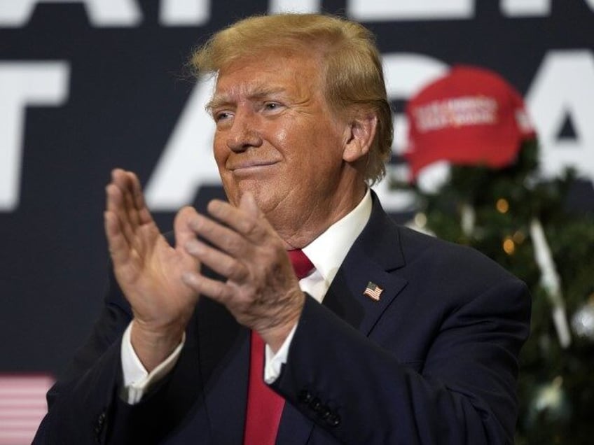 Former President Donald Trump reacts to supporters during a commit to caucus rally, Tuesday, Dec. 19, 2023, in Waterloo, Iowa. An appeals court said Tuesday, Jan. 2, 2024, that Michael Cohen can't hold Trump, his former boss, liable for allegedly jailing him in retaliation for writing a tell-all memoir. (AP …