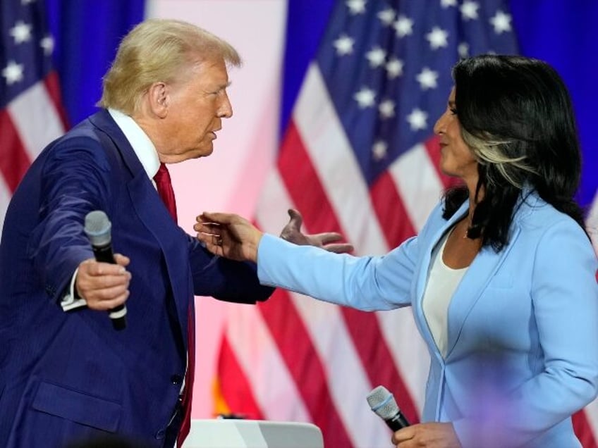 Republican presidential nominee former President Donald Trump greets former Democratic Rep