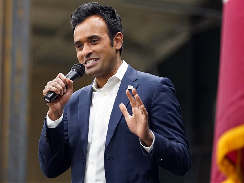 Republican presidential candidate businessman Vivek Ramaswamy speaks at a caucus site at H