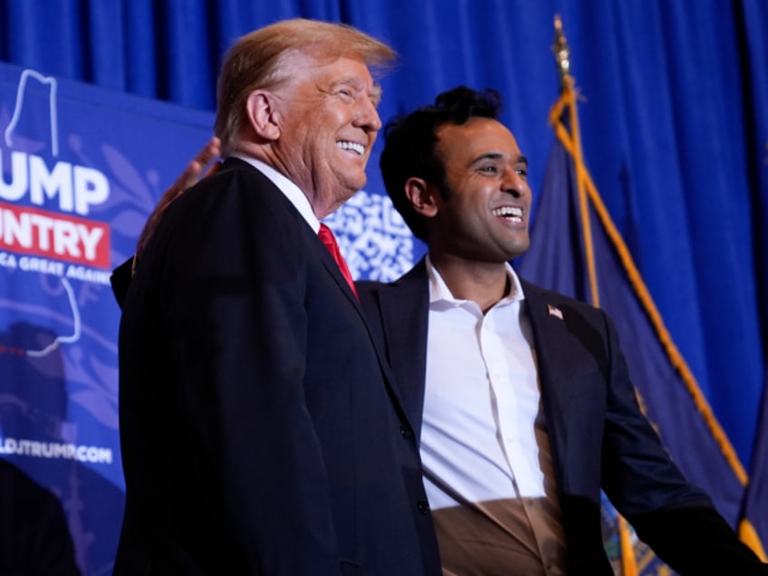 Republican presidential candidate former President Donald Trump appears on stage with former candidate Vivek Ramaswamy at a campaign event in Atkinson, N.H., Tuesday, Jan. 16, 2024. (AP Photo/Matt Rourke)