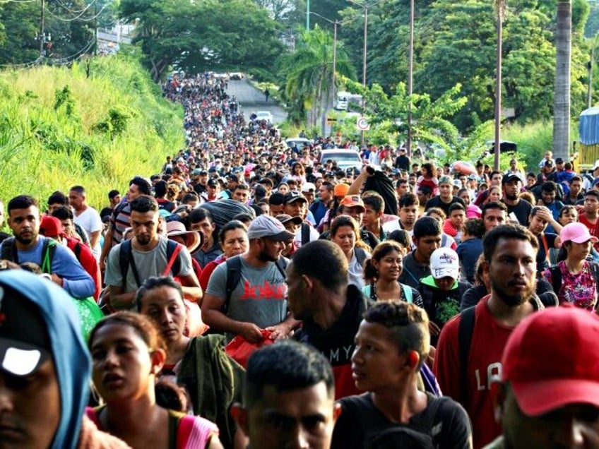 TAPACHULA, MEXICO - OCTOBER 30: Hundreds of migrants advance in a caravan to try to reach