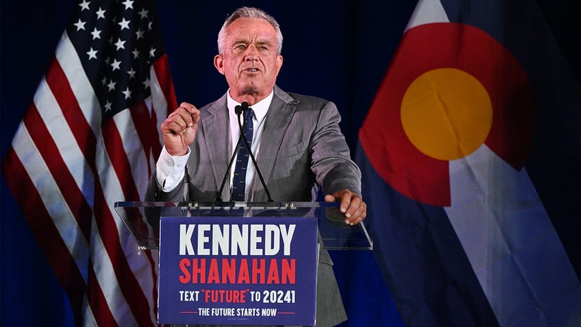 Robert F. Kennedy, Jr. behind podium