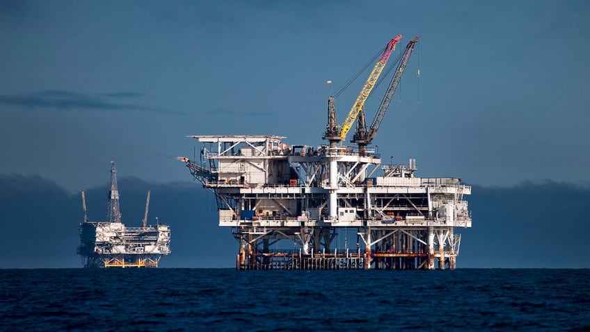 DCOR LLC's Edith offshore oil and gas platform, right, and Beta Operating Company LLC's Eureka oil and gas platform stand in the Beta Field off the coast of Long Beach, California.