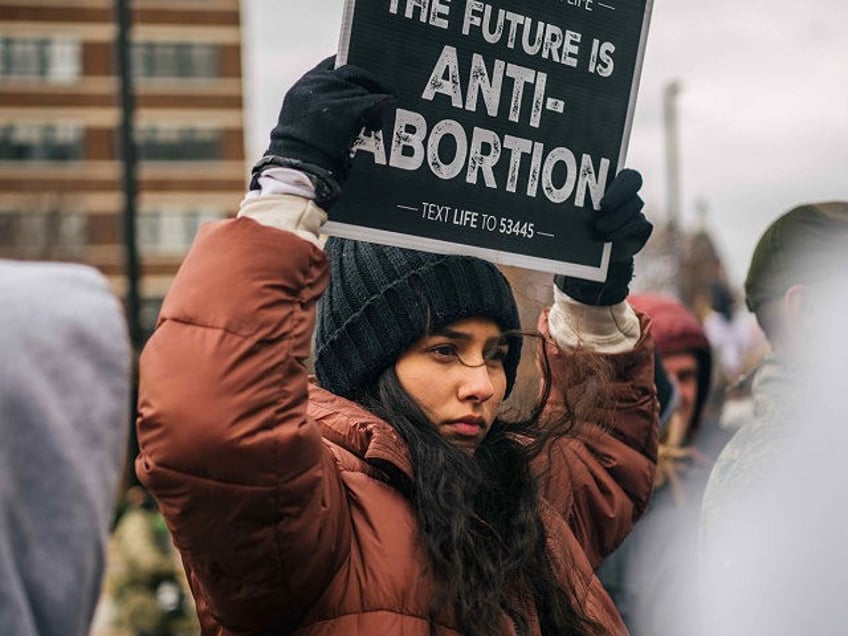 DALLAS, TEXAS - JANUARY 15: Pro-life demonstrators listen to organizers and activists duri