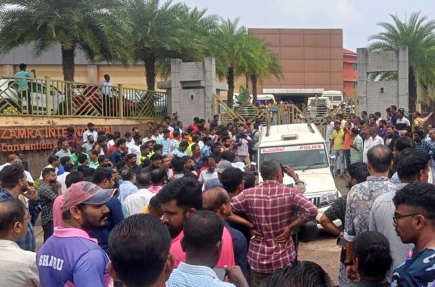 explosive device blows up at convention center in south india killing at least one and wounding 36