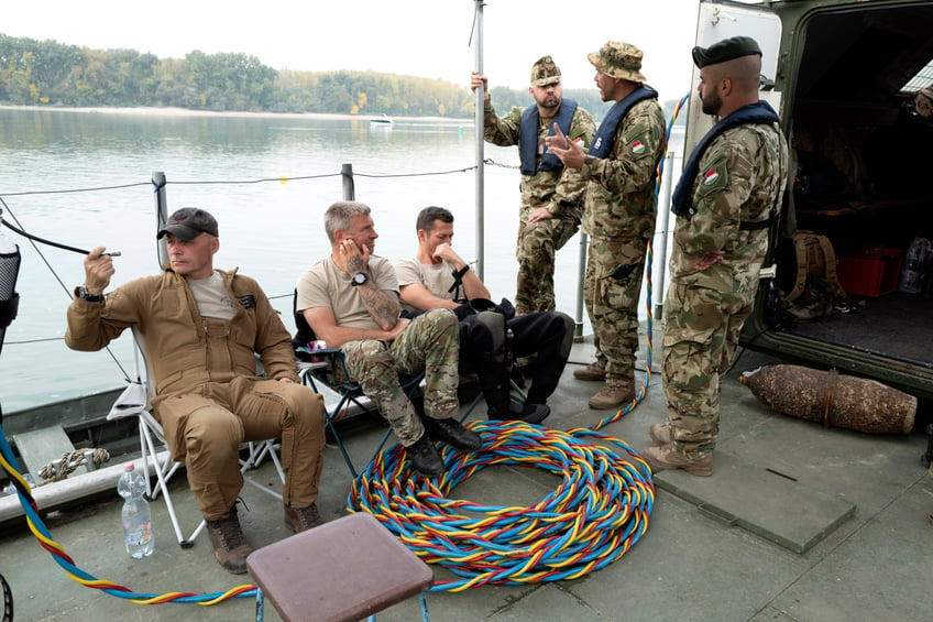 explosives disposal international military divers train together in flooded hungarian mine