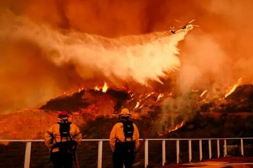 extra tankers and firefighters arrive in la as high winds threaten to return