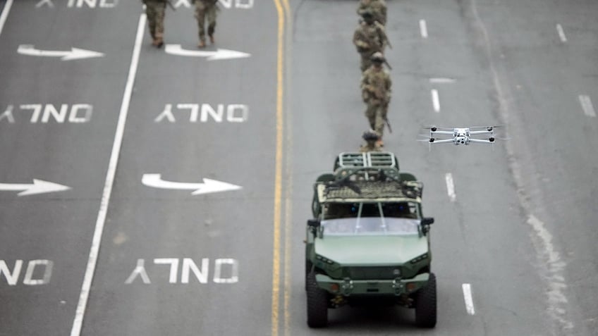 Drone flying above Army 250 parade