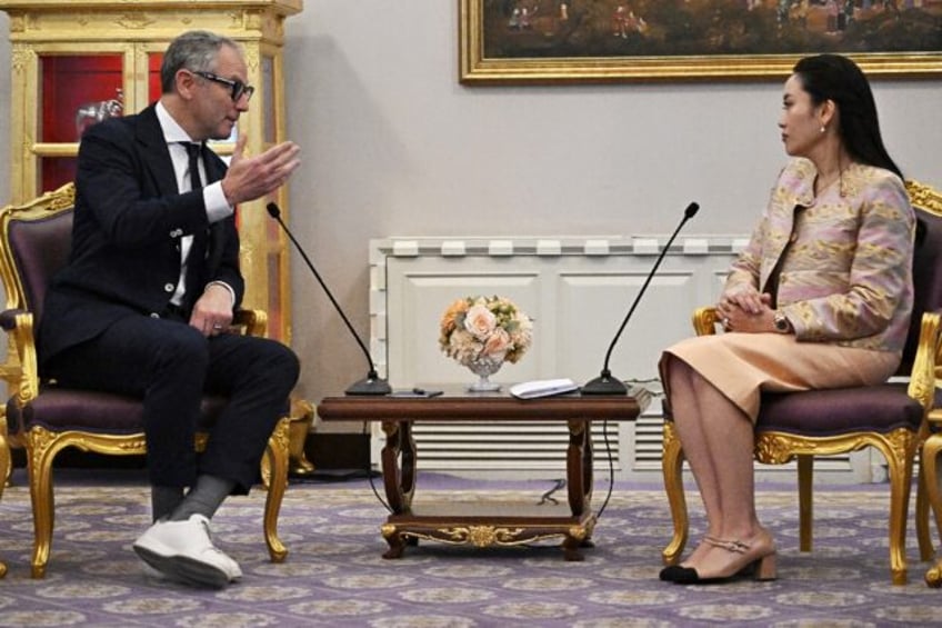 Formula One CEO Stefano Domenicali (L) held talks with Prime Minister Paetongtarn Shinawa