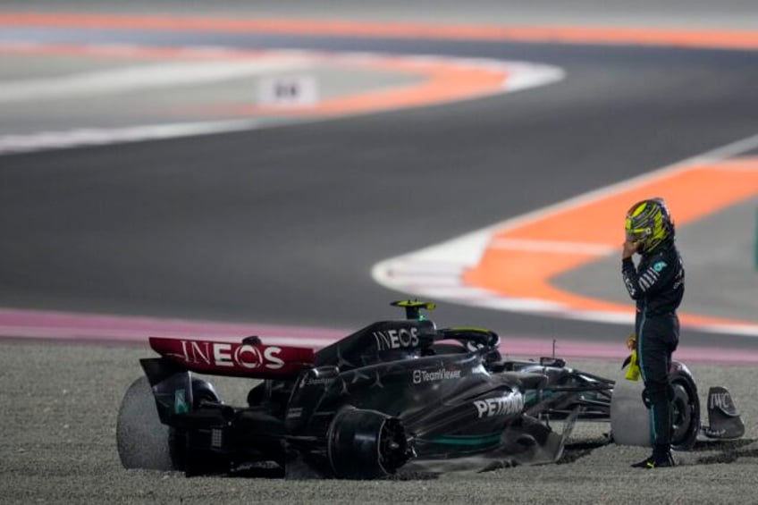 f1 governing body fia to review hamiltons actions after crossing track at qatar gp