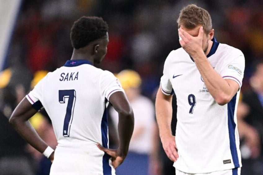 England captain Harry Kane and team-mate Bukayo Saka after the Euro 2024 final