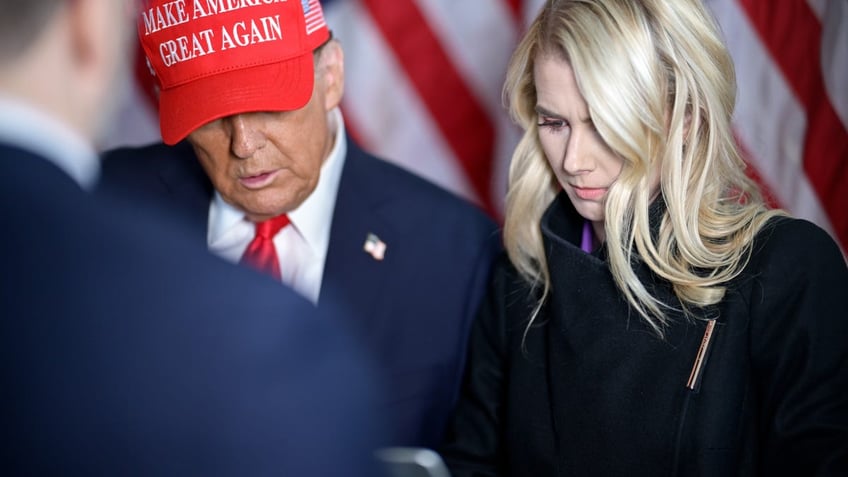 President Trump and his assistant, Natalie Harp.