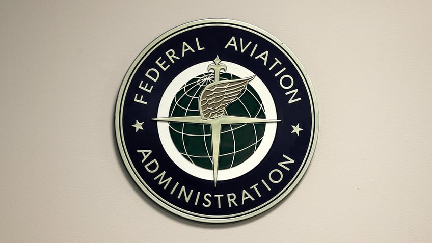 FAA logo sign on wall