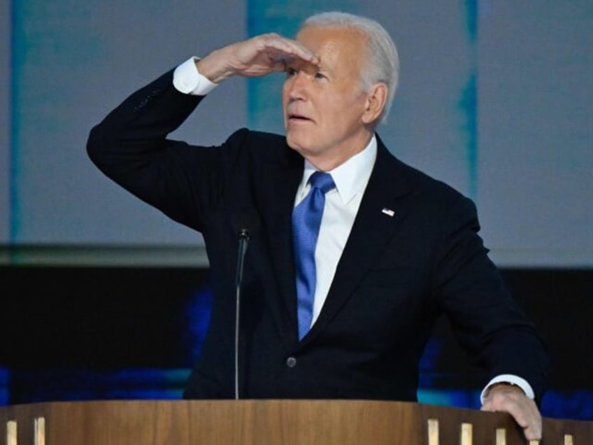 CHICAGO, ILLINOIS - August 19: President Joe Biden takes the stage before delivering the k