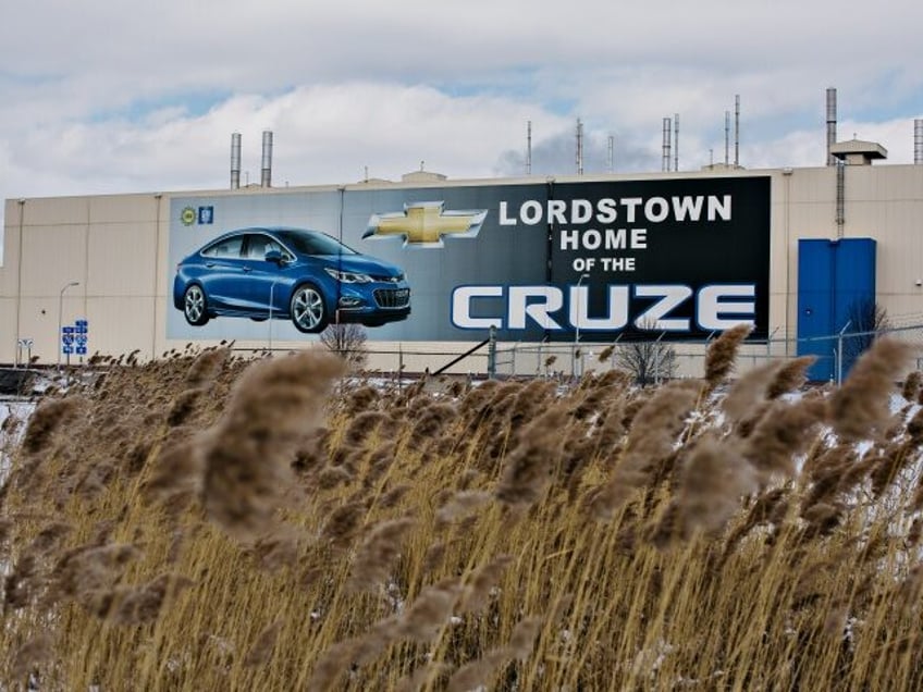 Bloomberg Pictures Of The Year 2019: Extreme Business. An image of a Chevrolet Cruze vehic