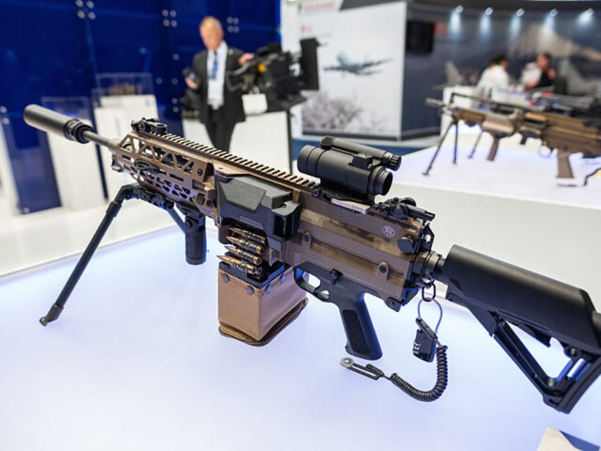 MADRID, SPAIN - 2025/05/12: A machine gun displayed during the International Defense and S