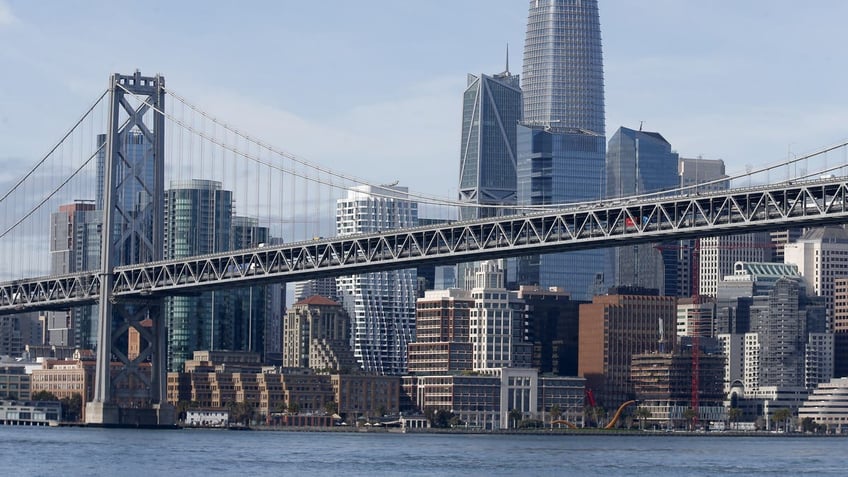 The Bay Bridge and the San Francisco skyline including the Salesforce Tower are seen in this view from the bay on Monday, March 9, 2020. 