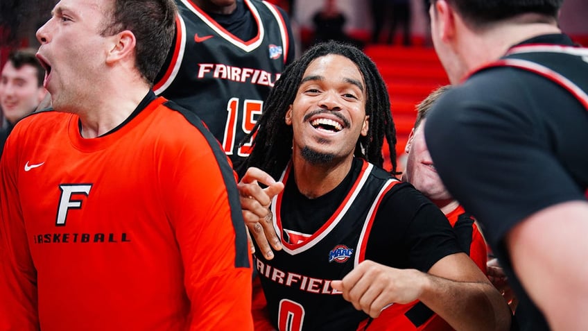 Deon Perry celebrates