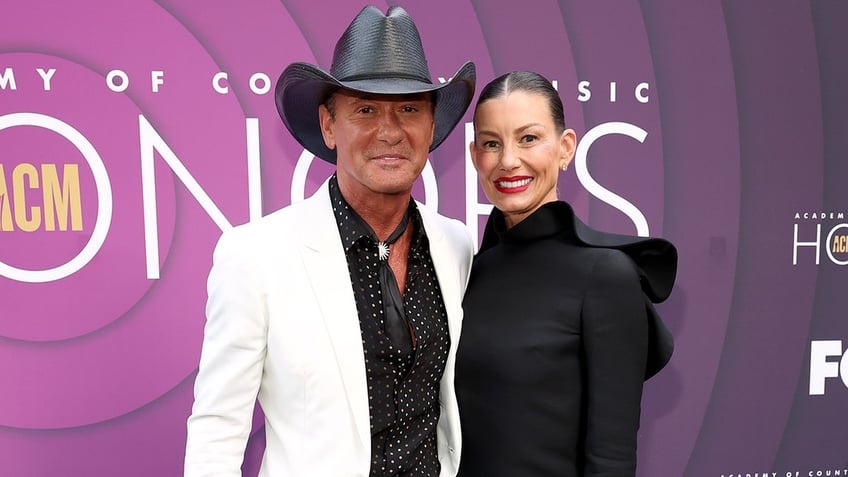 Tim McGraw and Faith Hill on the red carpet at the ACM Awards
