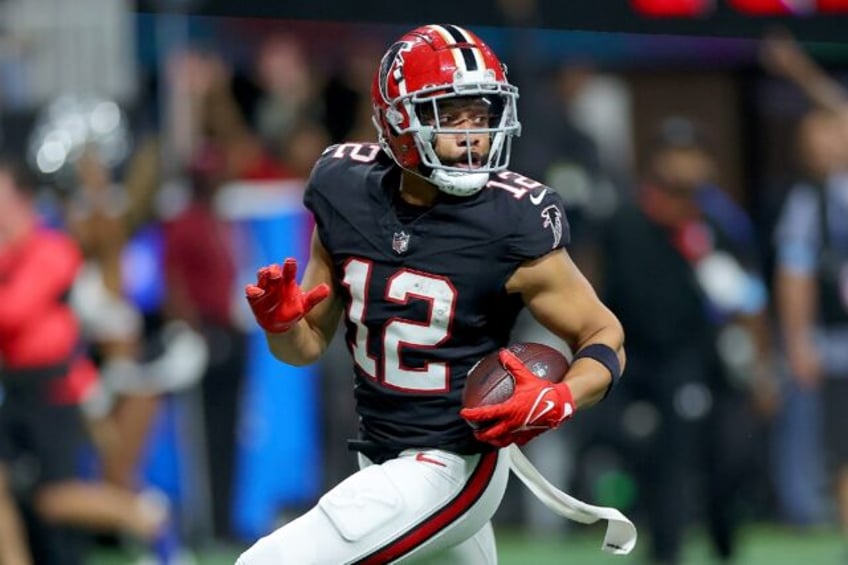 Atlanta's KhaDarel Hodge scores the game-winning touchdown in the Falcons' NFL overtime vi