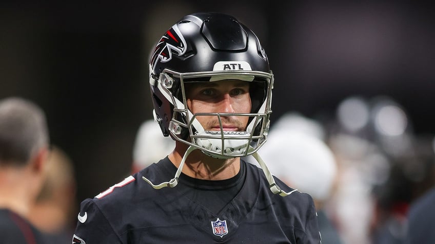 Kirk Cousins with his helmet on