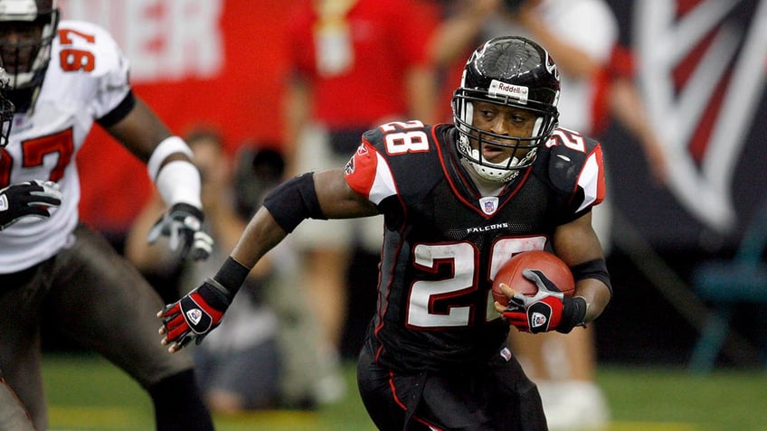 Warrick Dunn with Falcons