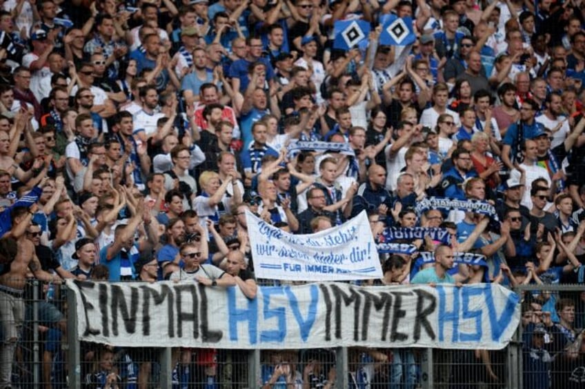 Hamburg fans display a banner reading 