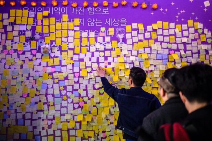 families hold mass commemoration for seoul 2022 crush victims