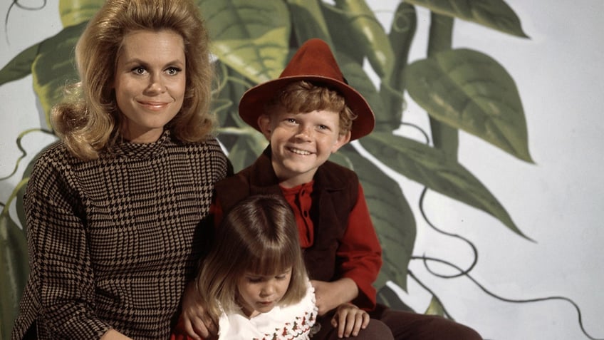 Johnny Whitaker smiling on the set of Bewitched