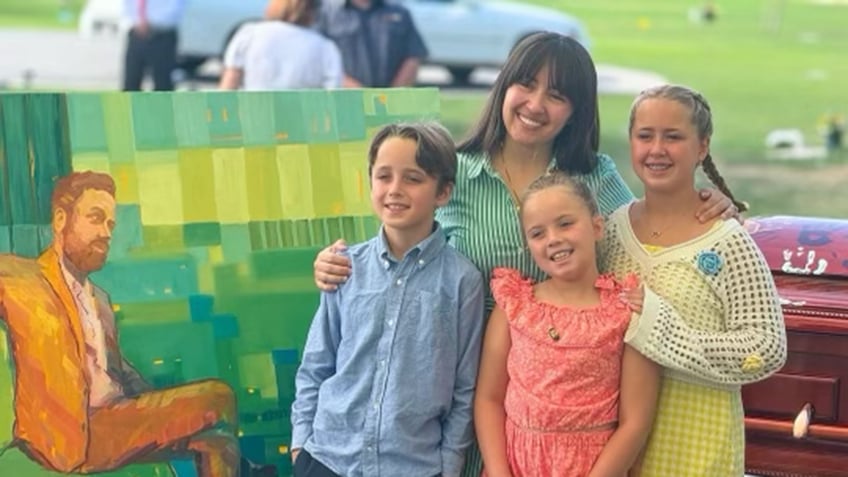 Young family at funeral