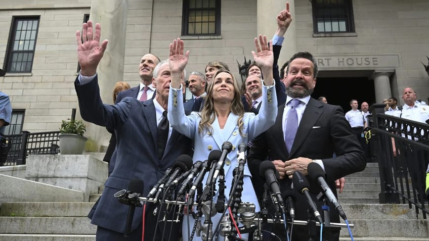 Karen Read, her lawyers and her family speak to reporters outside the courthouse after her acquittal on murder charges