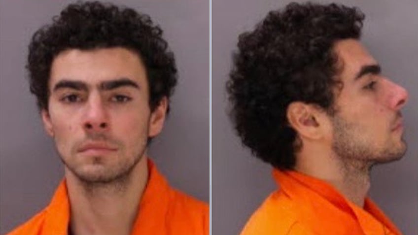 mangione official mugshot in orange jumpsuit with curly hair