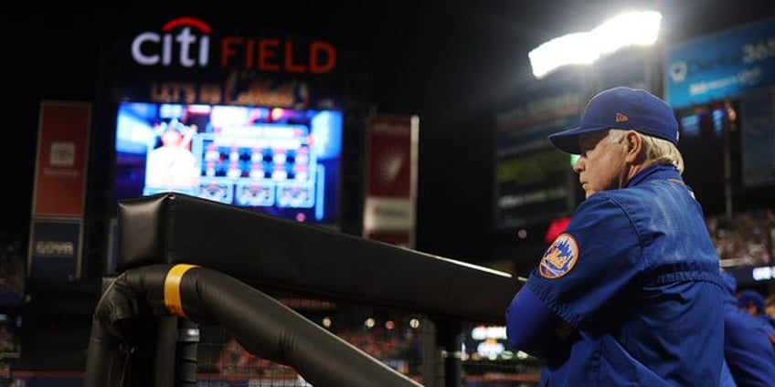 fan goes heels over head in chase for foul ball at mets game