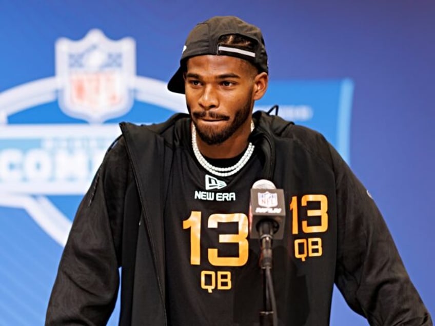 INDIANAPOLIS, INDIANA - FEBRUARY 28: Shedeur Sanders #QB13 of Colorado speaks at the podiu