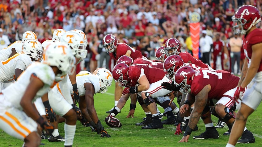 fan tackled by stadium security for streaking on field after alabama tennessee game