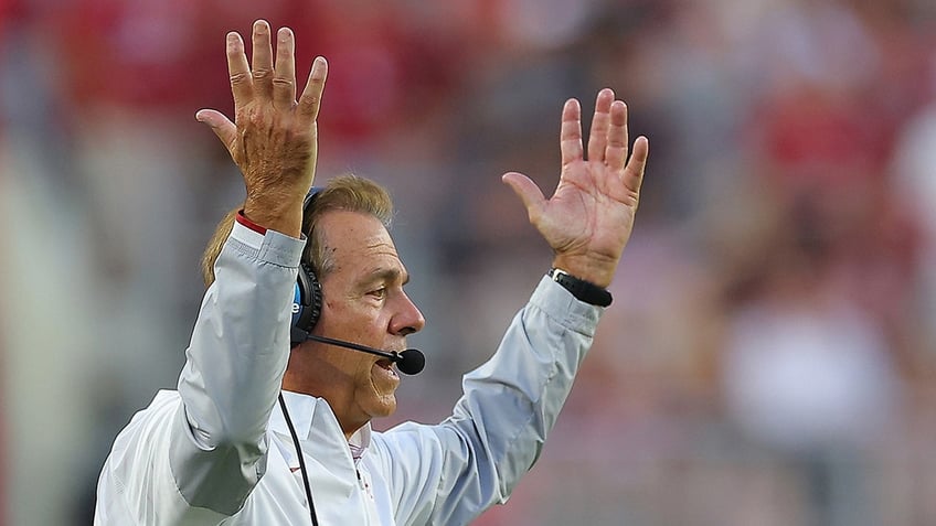 fan tackled by stadium security for streaking on field after alabama tennessee game