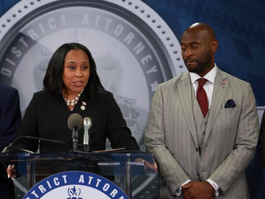 ATLANTA, GEORGIA - AUGUST 14: Fulton County District Attorney Fani Willis speaks during a