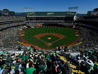 Fans throw objects, storm field during final A's game in Oakland