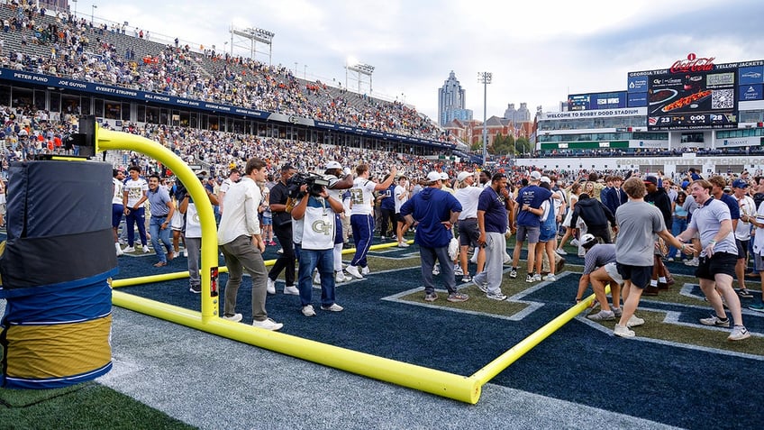 Georgia Tech students storm the field 