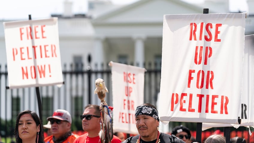 People rally for Leonard Peltier outside the White House