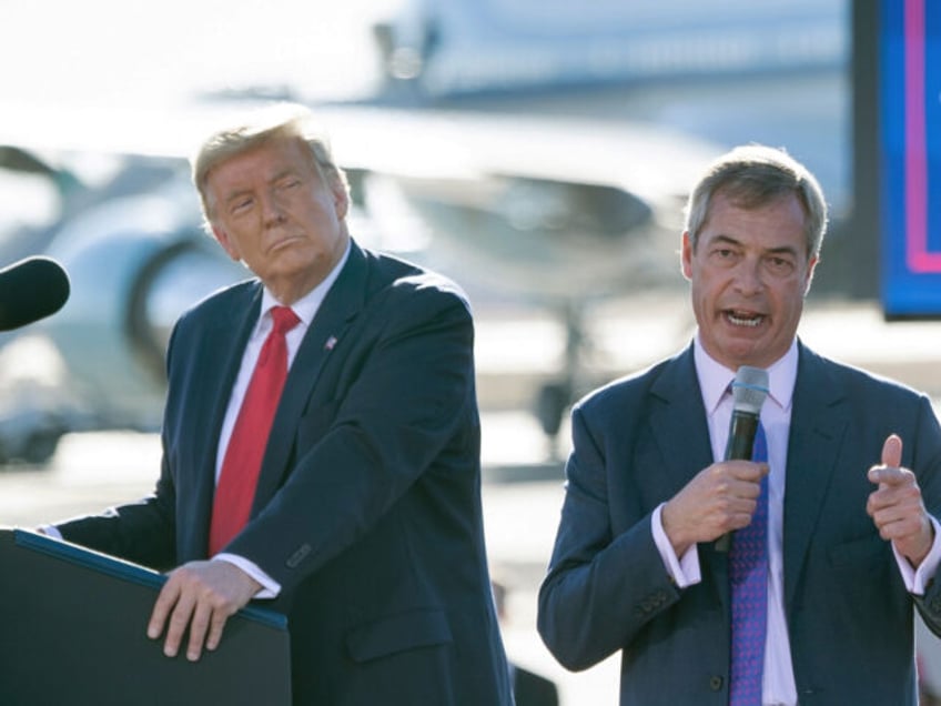 US President Donald Trump listens as Nigel Farage (R) speaks during a Make America Great Again rally at Phoenix Goodyear Airport October 28, 2020, in Goodyear, Arizona. (Photo by Brendan Smialowski / AFP) (Photo by BRENDAN SMIALOWSKI/AFP via Getty Images)