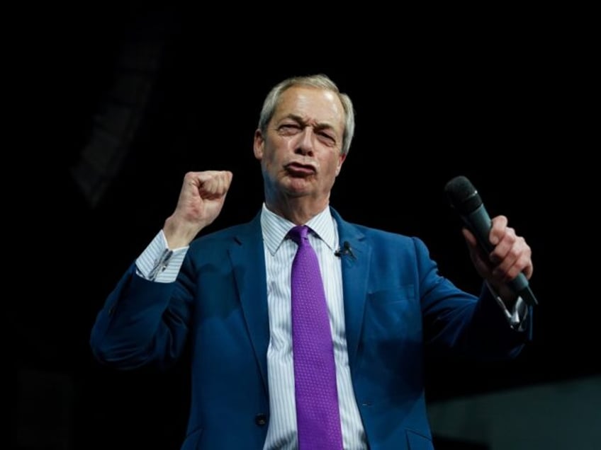 HOUGHTON LE SPRING, ENGLAND - FEBRUARY 01: Reform UK leader Nigel Farage MP reacts after h