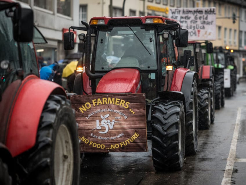 29 December 2023, North Rhine-Westphalia, Siegen: With a convoy of several hundred tractors, farmers in the Siegen area protested on Friday against the savings plans of the traffic light coalition. Photo: Christian Knieps/dpa (Photo by Christian Knieps/picture alliance via Getty Images)