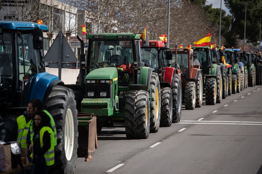 ARGANDA DEL REY MADRID, SPAIN - FEBRUARY 10: Several tractors stopped on the road during the fifth day of protests by farmers and ranchers to demand improvements in the sector, on 10 February, 2024 in Arganda del Rey, Madrid, Spain. The 6F Platform has called for farmers and ranchers to enter Madrid with tractors, in order to reach the PSOE headquarters in Ferraz. Today marks the fifth day of protests, and farmers and ranchers have taken their tractors to the roads to demand improvements in the sector, including aid to deal with the droughts suffered by the countryside. They are also protesting against European policies and their lack of profitability. (Photo By Alejandro Martinez Velez/Europa Press via Getty Images)