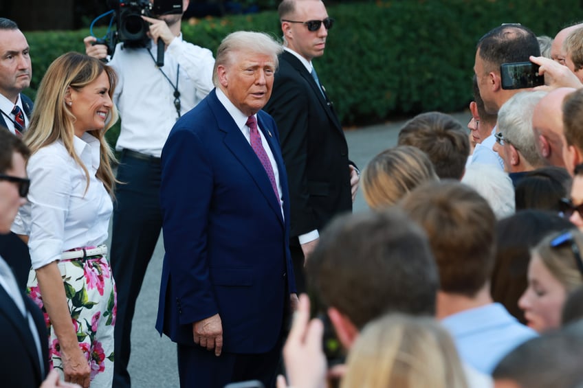 fashion notes melania trump hosts white house picnic in fuchsia dolce gabbana