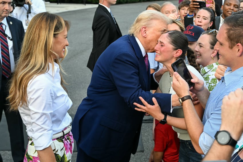 fashion notes melania trump hosts white house picnic in fuchsia dolce gabbana