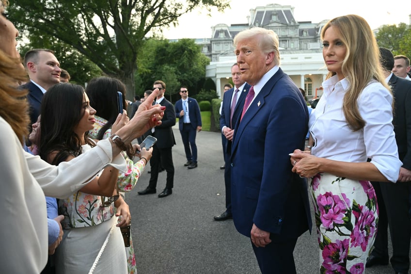 fashion notes melania trump hosts white house picnic in fuchsia dolce gabbana