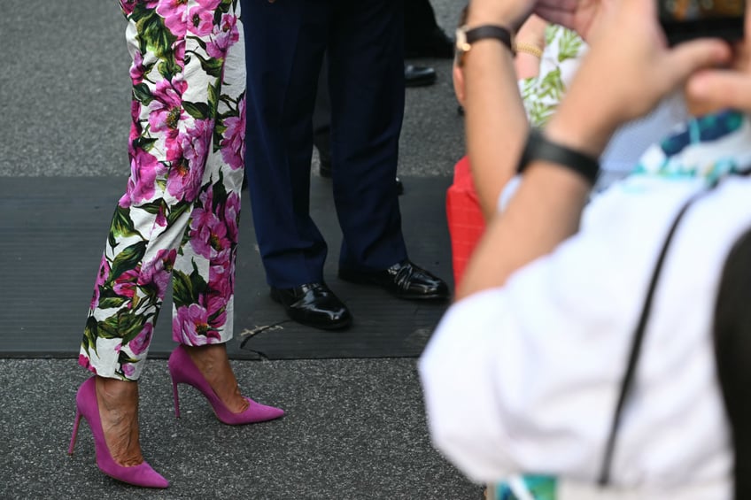 fashion notes melania trump hosts white house picnic in fuchsia dolce gabbana
