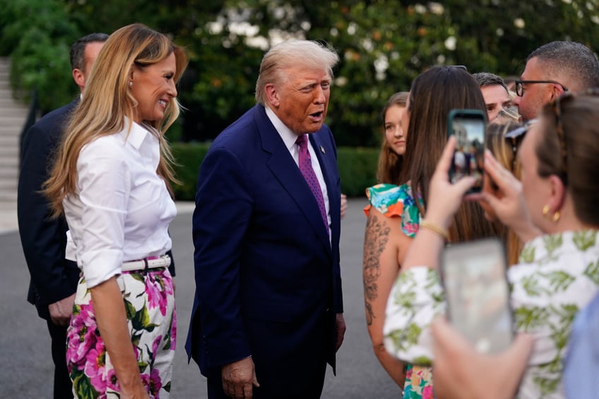 fashion notes melania trump hosts white house picnic in fuchsia dolce gabbana