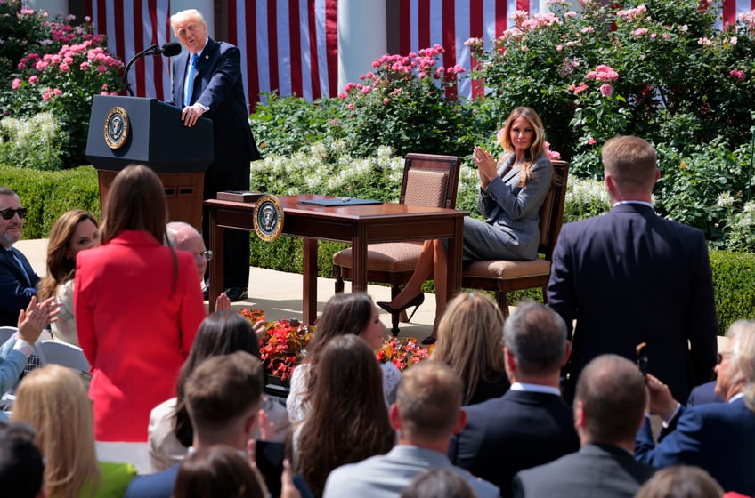 fashion notes melania trump is all business in prada suit python pumps